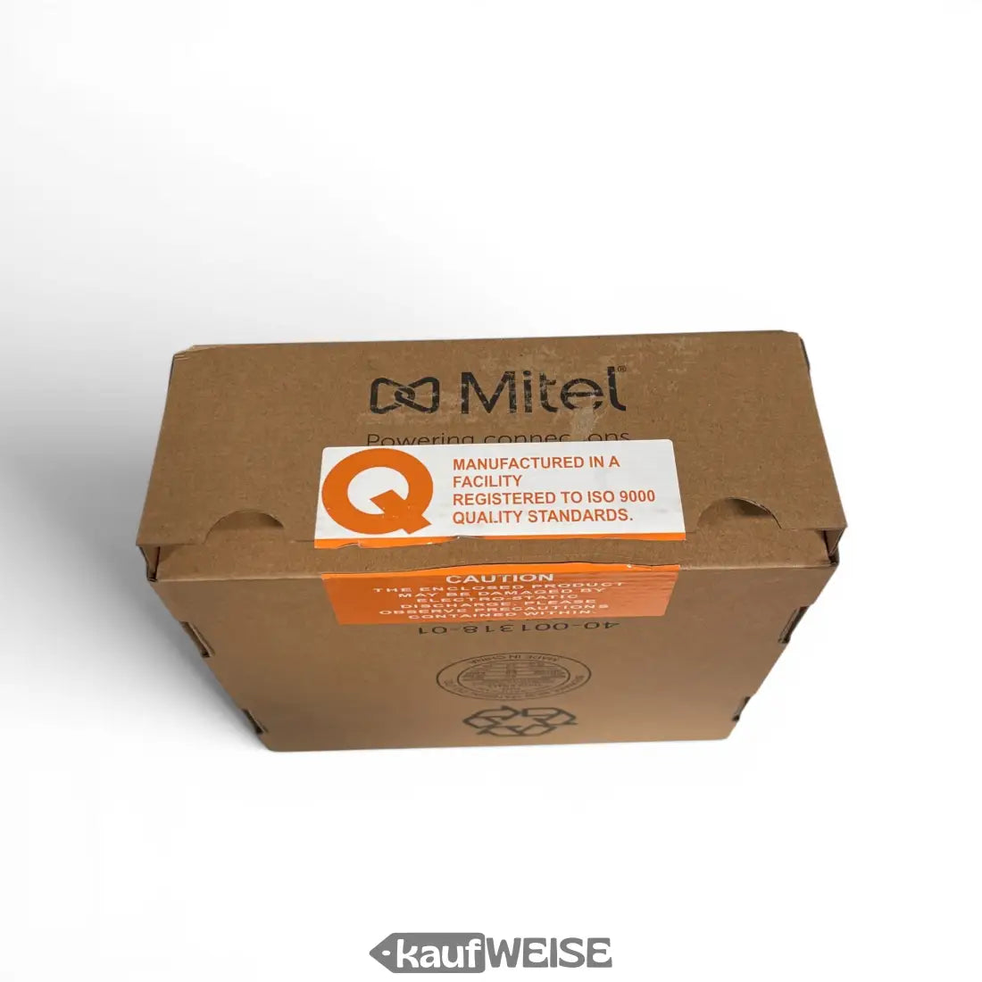 Brauner karton mit schwarzem mitel-logo und orange weißen etiketten für mitel m695 lcd-erweiterungsmodul