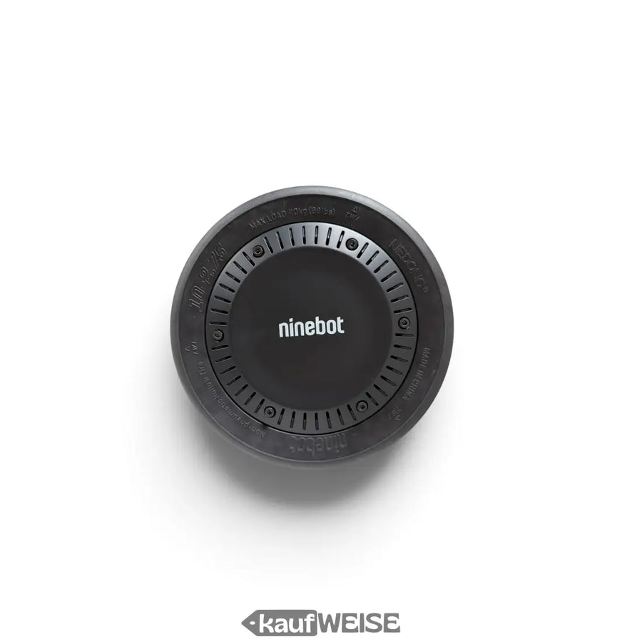 Schwarze runde ladestation aus mattiertem material mit geprägtem branding für segway ninebot gokart pro radnabenmotor