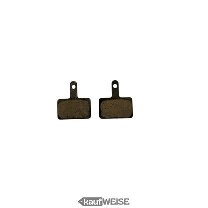 Black bicycle brake pads with textured friction surface and metal backing for urban armor scheibenbremse set